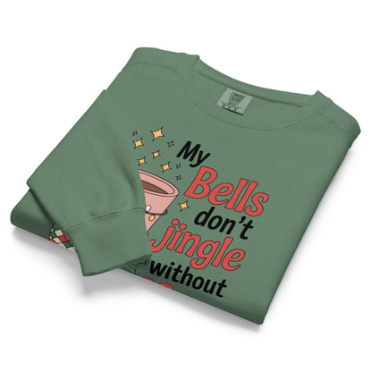 Folded green sweatshirt with humorous text design on a white background