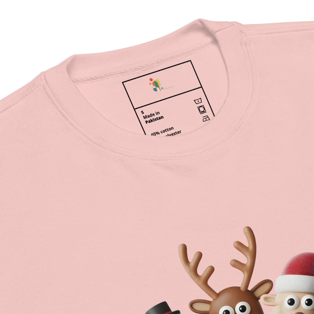 Pink sweatshirt with cartoon reindeer and Santa Claus design, showing brand label.