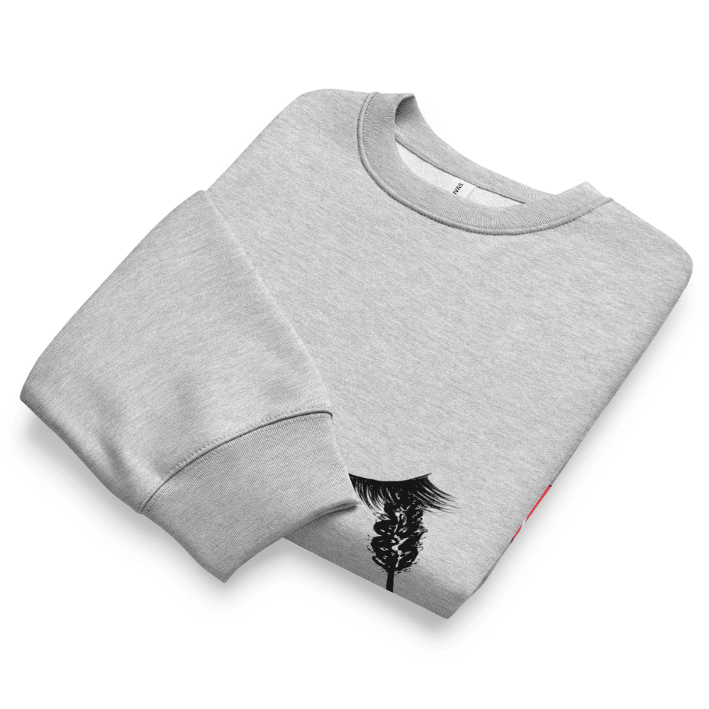 Folded gray sweatshirt with a black graphic design on a white background