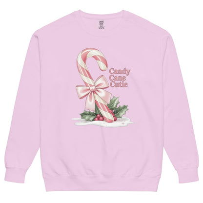Pink sweatshirt with candy cane and bow design on a white background