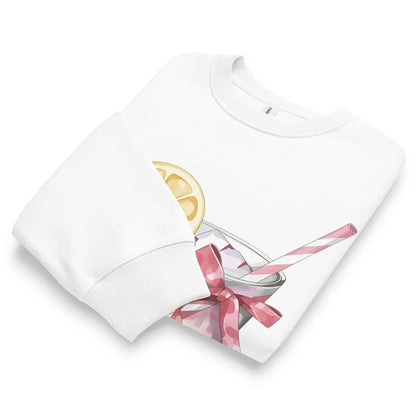 White t-shirt with a graphic of a cocktail with a lemon slice and pink straw on a white background