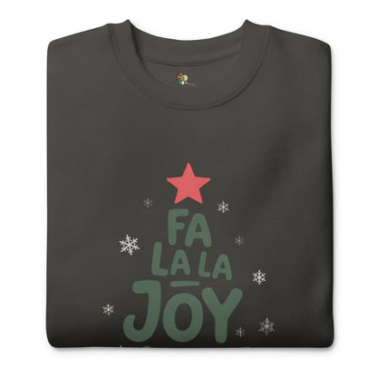 Folded black t-shirt with 'Fa La La Joy' text and star design on a white background