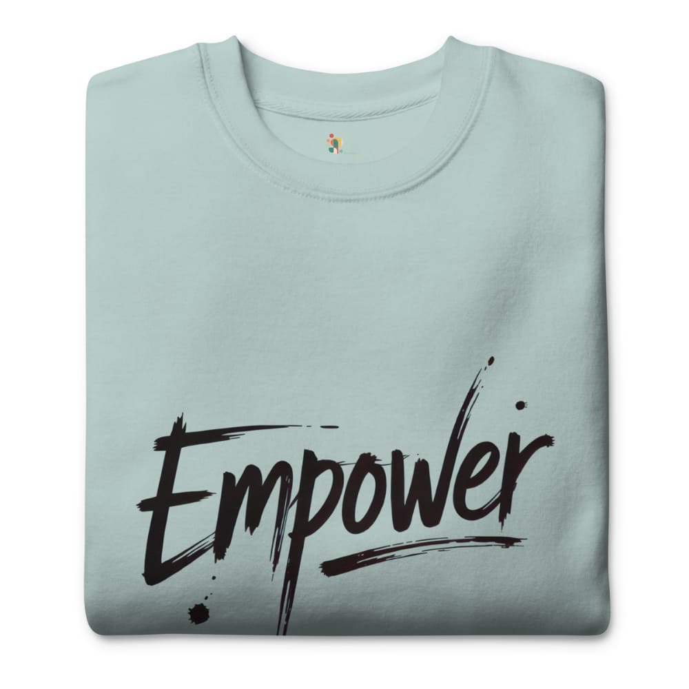 Light blue t-shirt with 'Empower' text on a white background