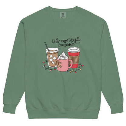 Green sweatshirt with coffee-themed design on a white background