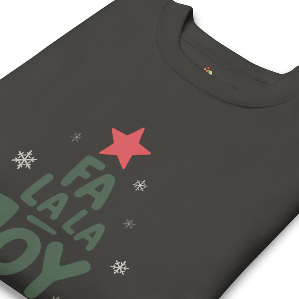 Black t-shirt with green text, red star, and white snowflakes on a white background