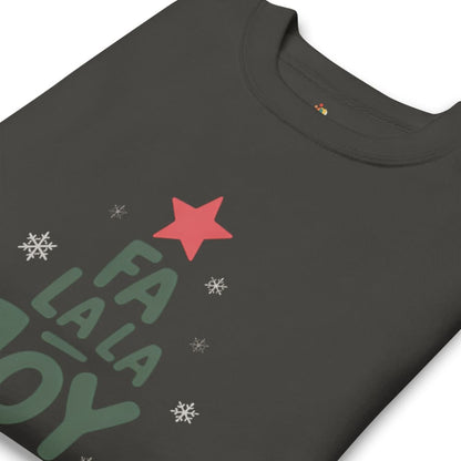 Black t-shirt with green text, red star, and white snowflakes on a white background