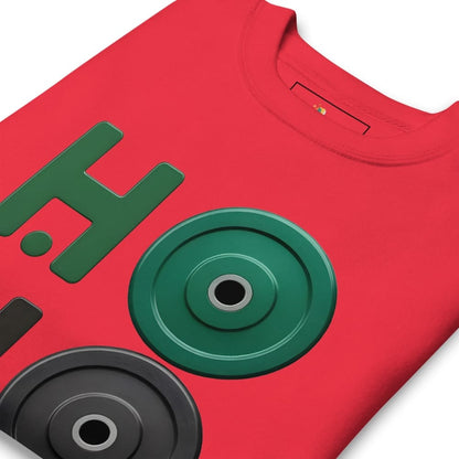 Red t-shirt with green and black graphic design on a white background
