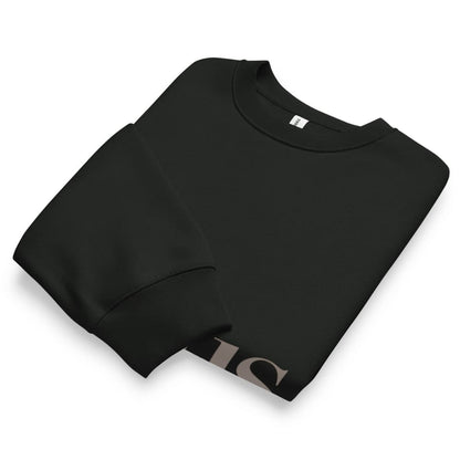 Folded black sweatshirt on a white background