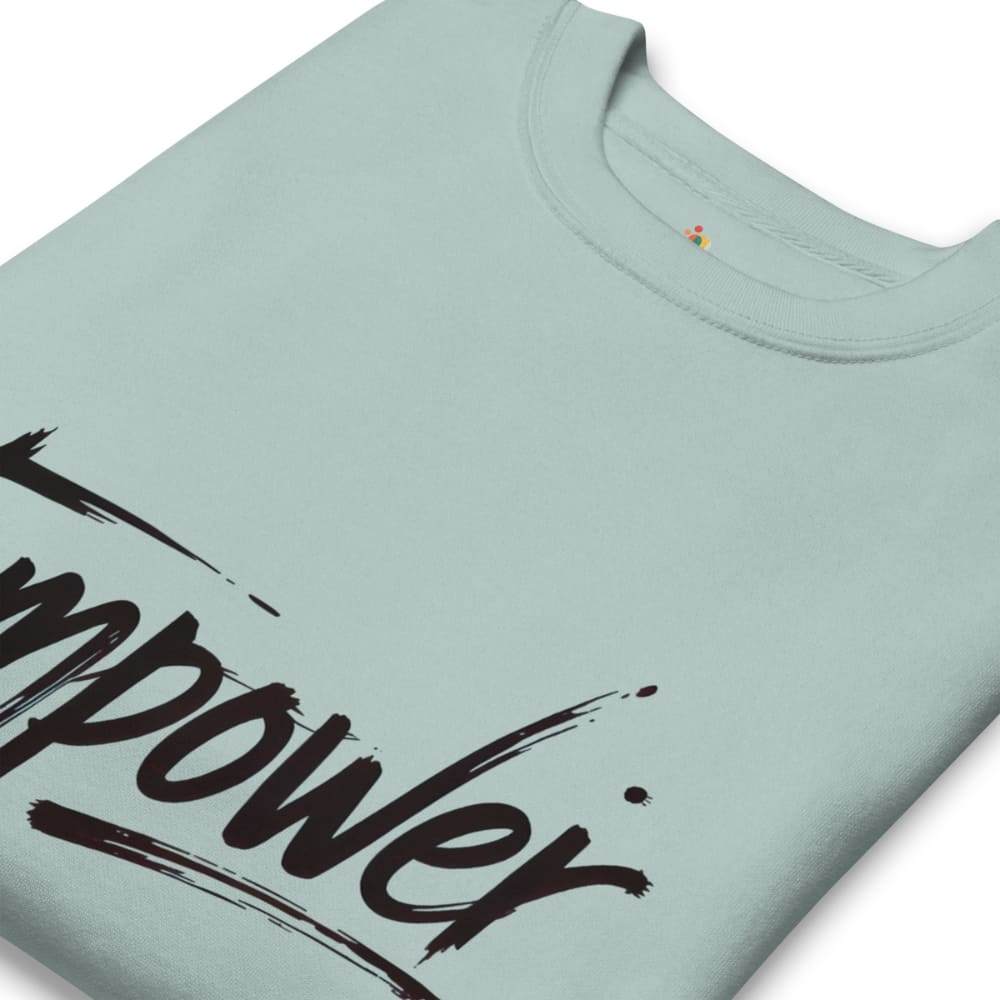 Light blue t-shirt with black text 'empower' on a white background