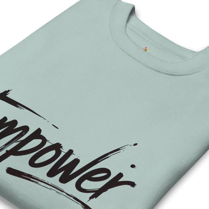 Light blue t-shirt with black text 'empower' on a white background
