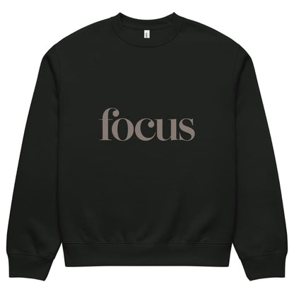 Black sweatshirt with 'focus' text on a white background