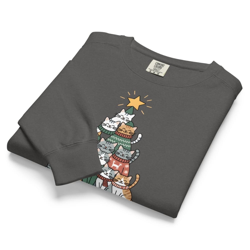 Folded dark gray sweatshirt with a Christmas tree design featuring cats on a white background