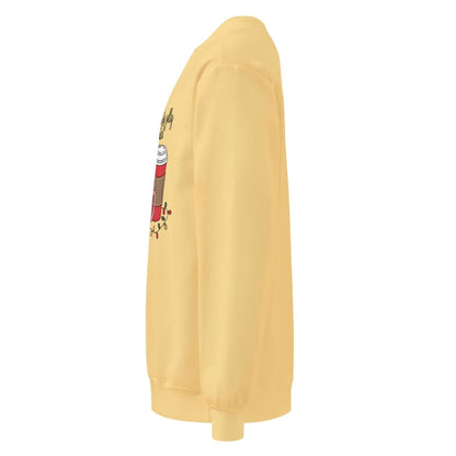Yellow sweatshirt with a cartoon character on the sleeve against a white background