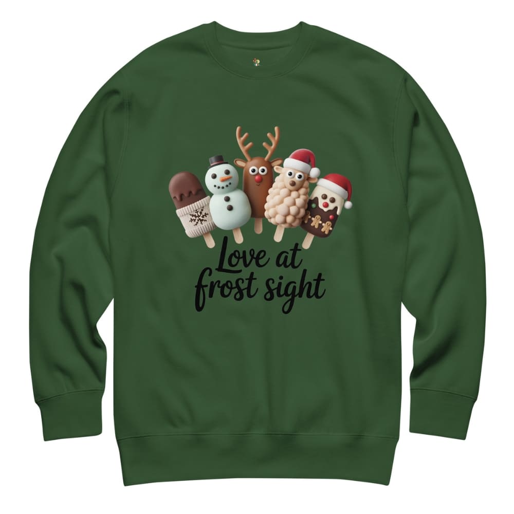 Green sweatshirt with Christmas-themed design and text on a white background