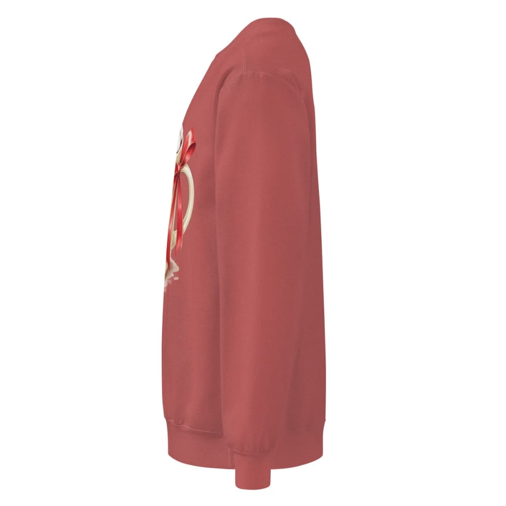 Red sweatshirt with a graphic design on the sleeve against a white background