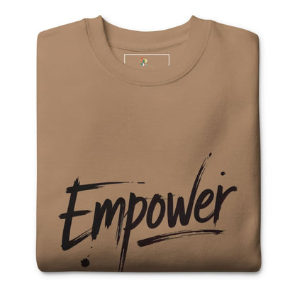 Folded brown t-shirt with 'Empower' text on a white background