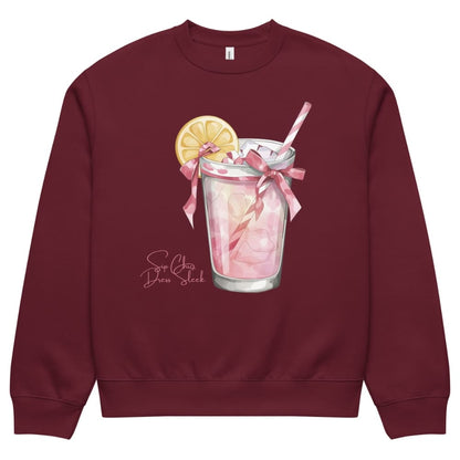 Maroon sweatshirt with a pink drink and lemon design on a white background