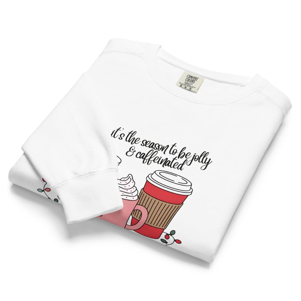 White sweatshirt with a coffee cup graphic and text on a white background