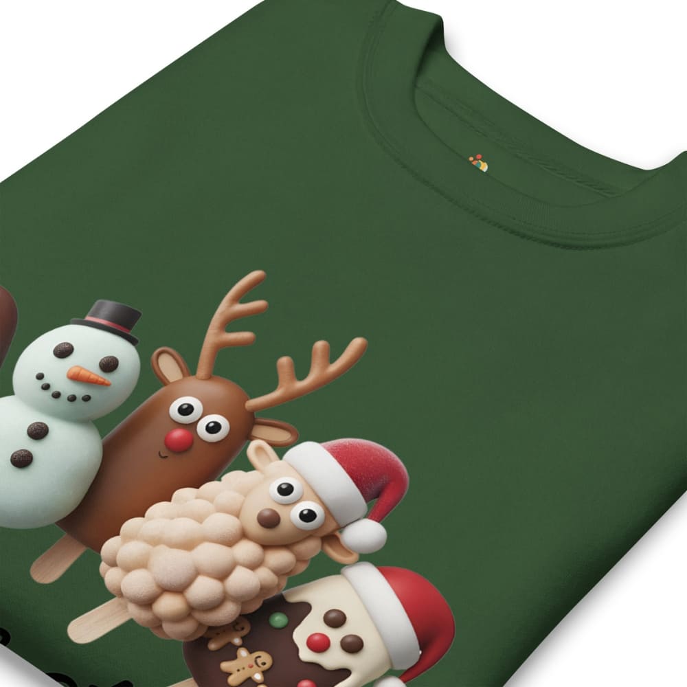 Green t-shirt with Christmas-themed characters including a reindeer, snowman, and gingerbread man on a white background.