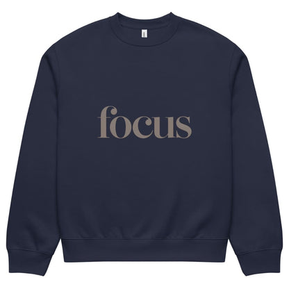 Navy blue sweatshirt with 'focus' text on a white background