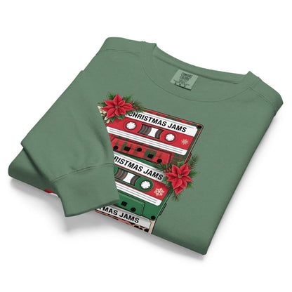 Green sweatshirt with Christmas-themed cassette tape design on a white background