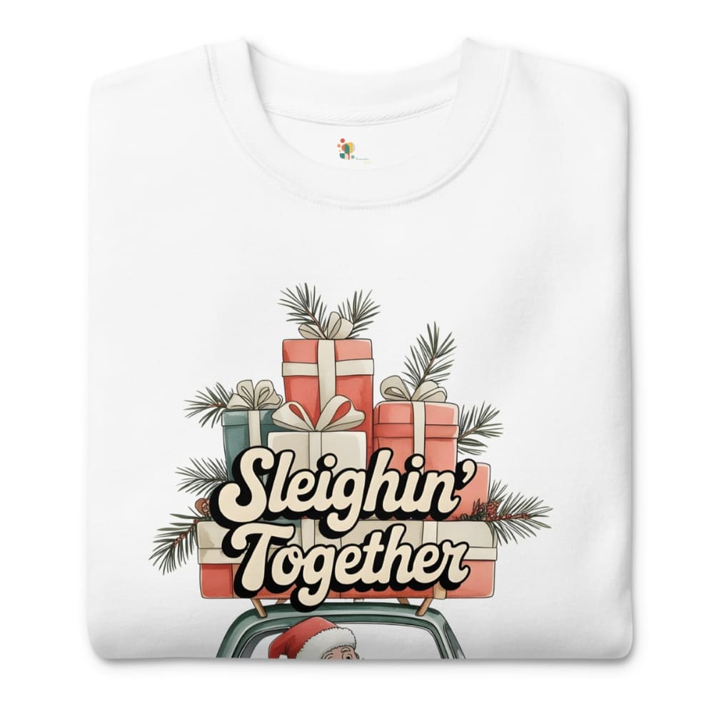 White t-shirt with Christmas-themed design featuring presents and 'Sleighin' Together' text on a white background.