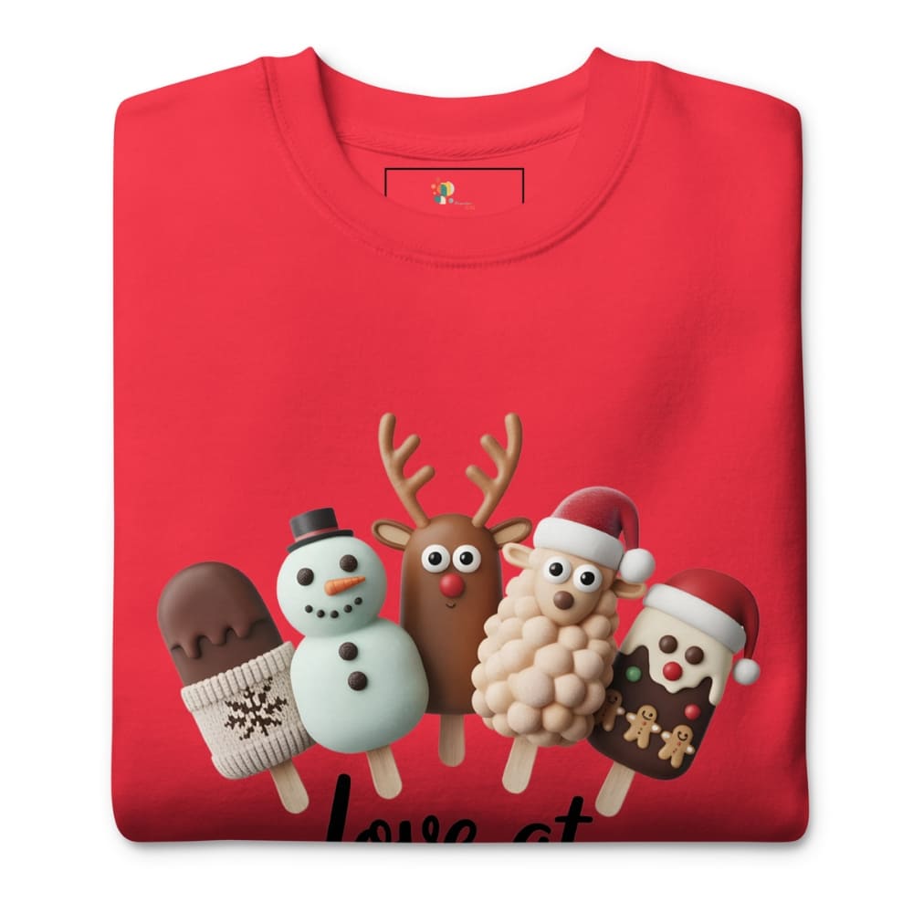 Red t-shirt with Christmas-themed ice cream cone characters on a white background