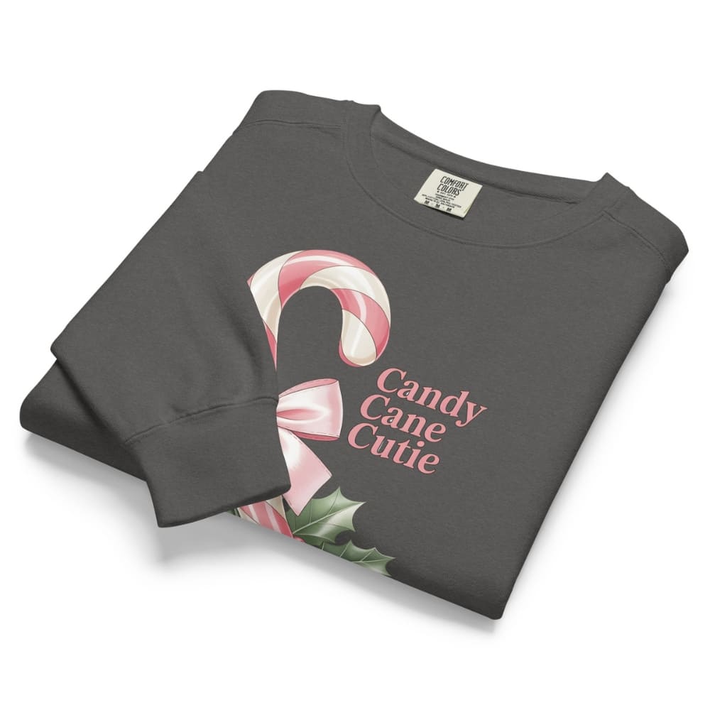 Folded dark gray sweatshirt with candy cane design and 'Candy Cane Cutie' text on a white background