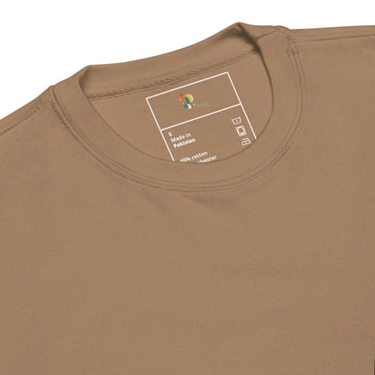 Close-up of a brown t-shirt with a label on the collar.