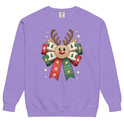 Purple sweatshirt with a reindeer and bow design on a white background