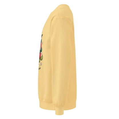 Yellow sweatshirt with a colorful graphic on the sleeve against a white background