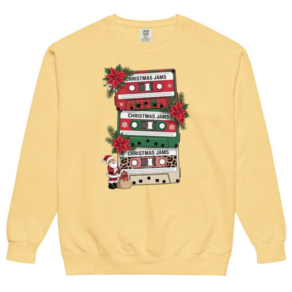 Yellow sweatshirt with Christmas-themed cassette tape design on a white background