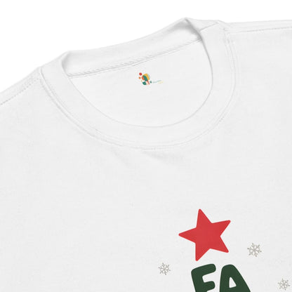 White shirt with red star and green text on a white background