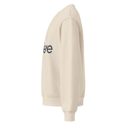 Beige hoodie with a logo on the chest against a white background