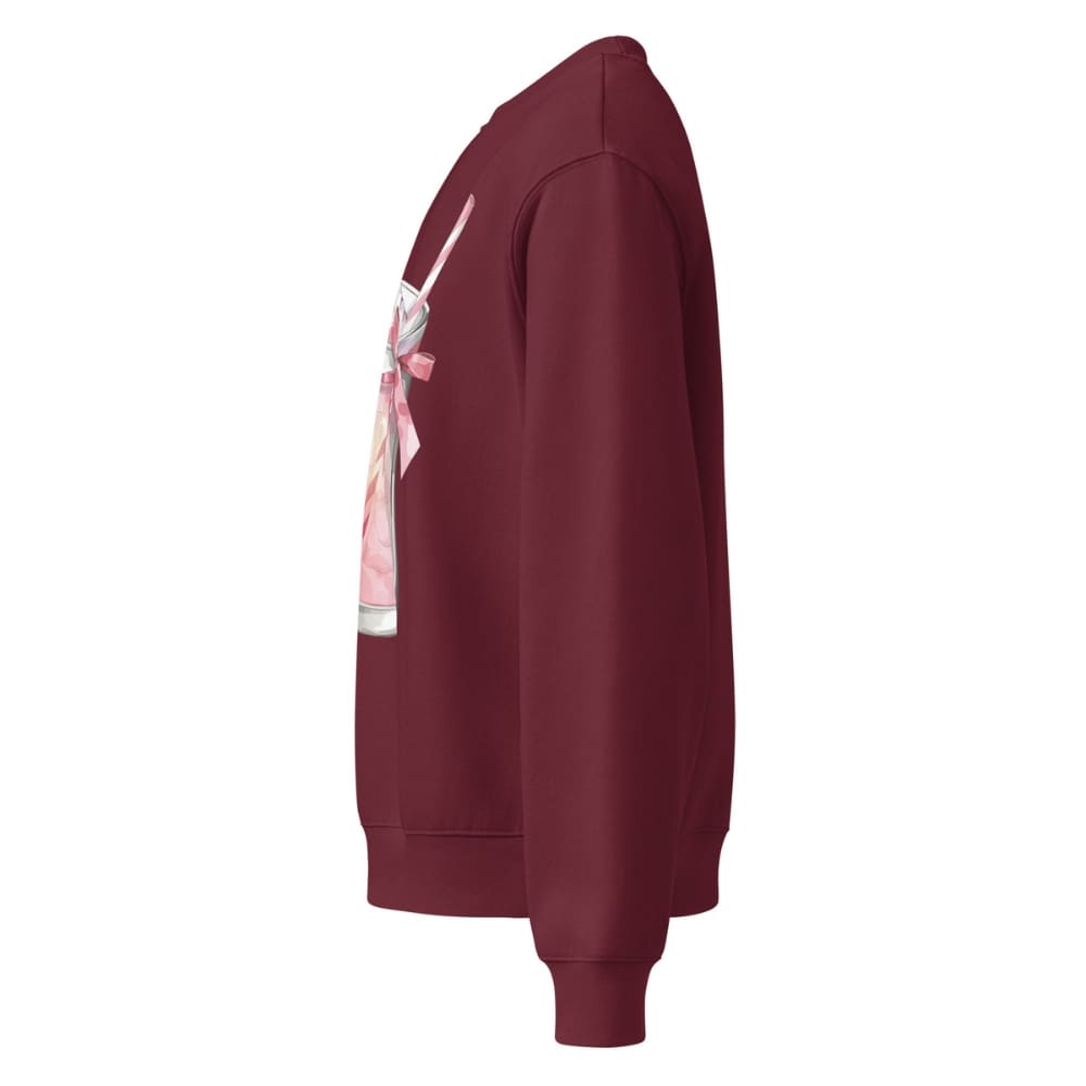 Maroon sweatshirt with a graphic design on the sleeve against a white background
