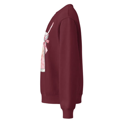 Maroon sweatshirt with a graphic design on the sleeve against a white background