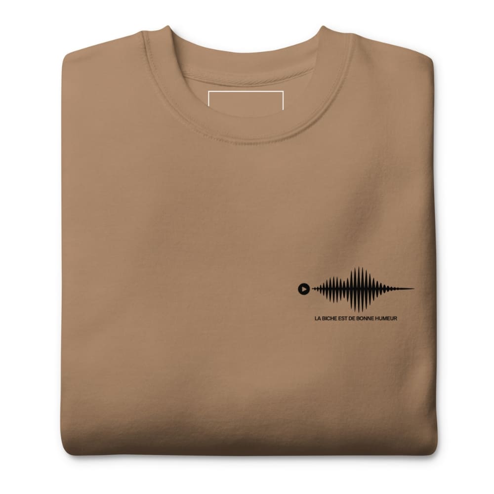 Folded brown sweatshirt with a black graphic design on a white background