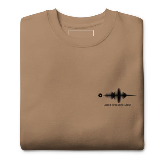Folded brown sweatshirt with a black graphic design on a white background