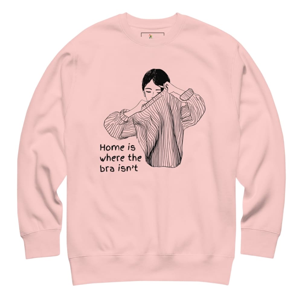 Pink sweatshirt with a graphic of a woman and text 'Home is where the bra isn't' on a white background