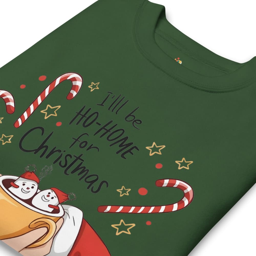 Green t-shirt with Christmas-themed design featuring snowmen and candy canes on a white background.