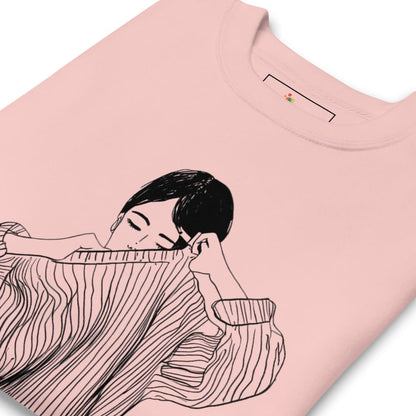 Pink t-shirt with a black and white illustration of a woman holding a dress on a white background