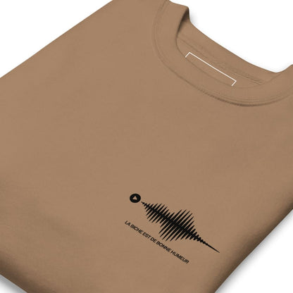 Brown t-shirt with a black graphic design on a white background