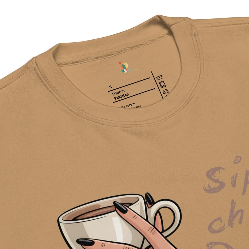 Brown t-shirt with a graphic of a hand holding a coffee cup and text on a white background