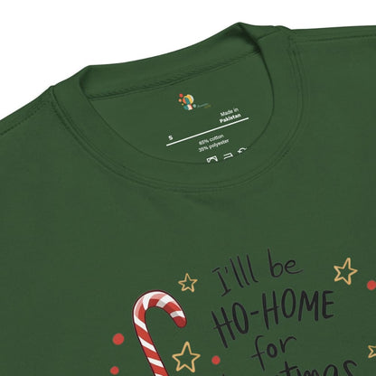 Green t-shirt with Christmas-themed text and candy cane design on a white background
