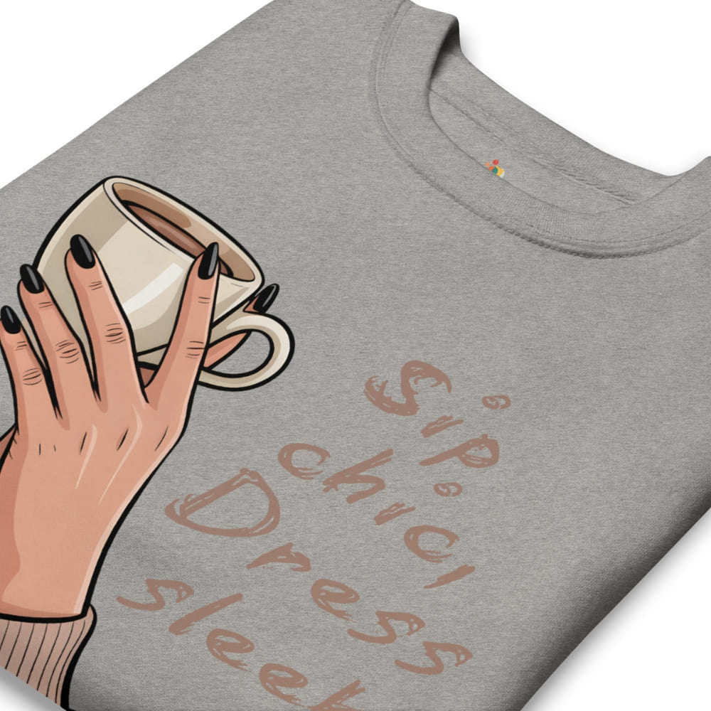 Gray t-shirt with a hand holding a coffee cup graphic and text on a white background