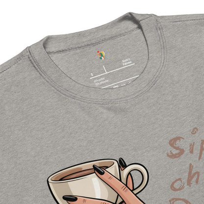 Gray t-shirt with a graphic of a hand holding a coffee cup and text on a white background