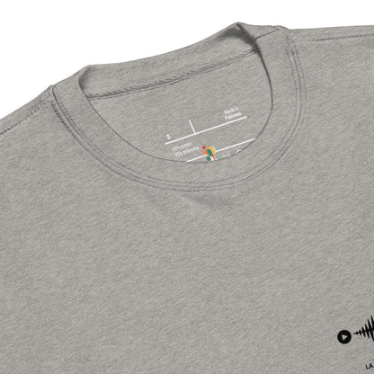 Gray t-shirt with brand logo on the collar and text on a white background