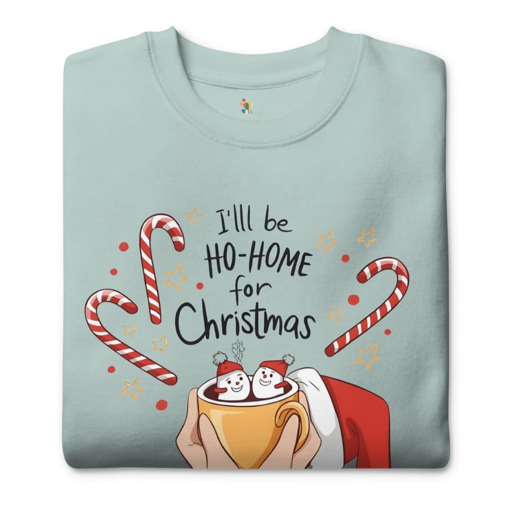 Light blue t-shirt with Christmas design featuring candy canes, snowmen, and text on a white background.