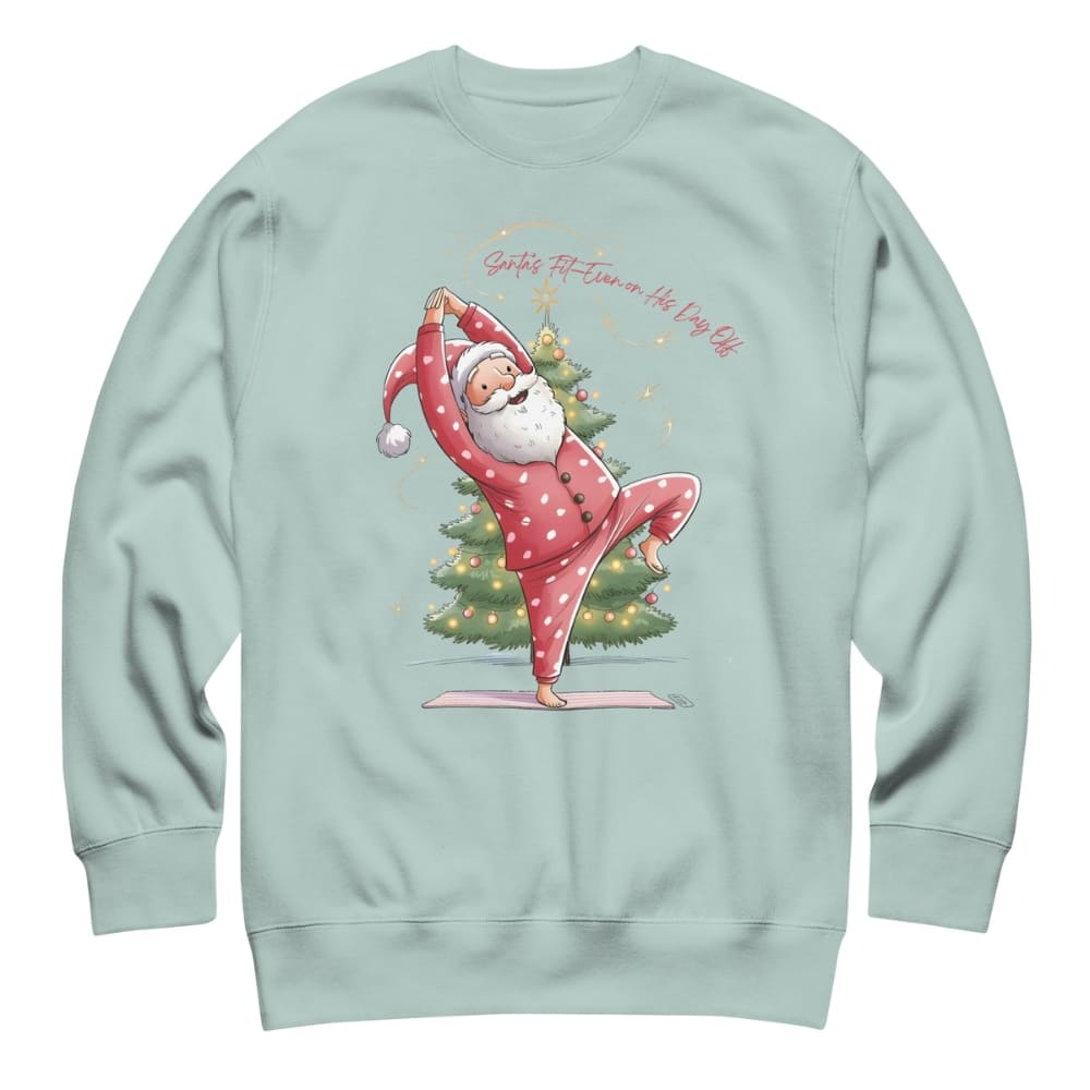Light blue sweatshirt with a Christmas-themed design of Santa Claus doing yoga next to a tree.