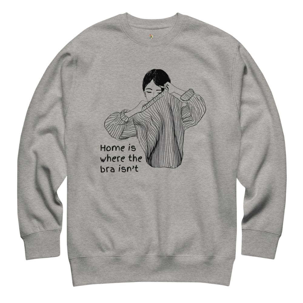 Gray sweatshirt with a graphic of a woman holding a bra and text 'Home is where the bra isn't' on a white background.